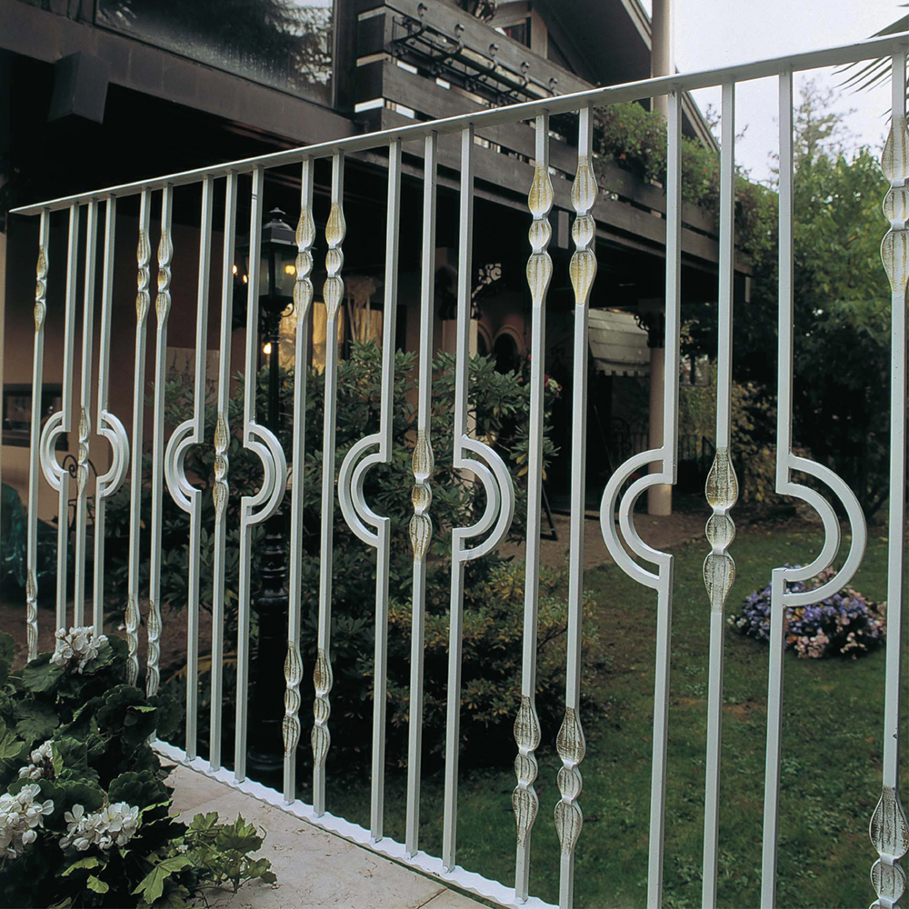 Modern looking fence with half moon balusters